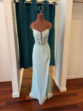 Fitted sequin evening gown with high slit
